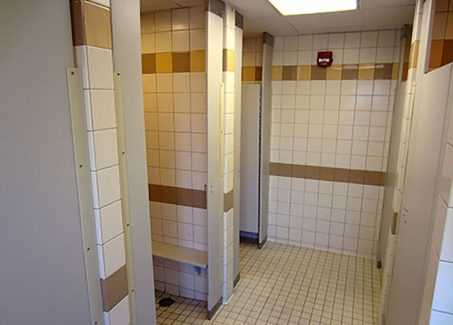 Bathroom view of shower stalls
