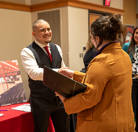 Tabling at RA Conference.