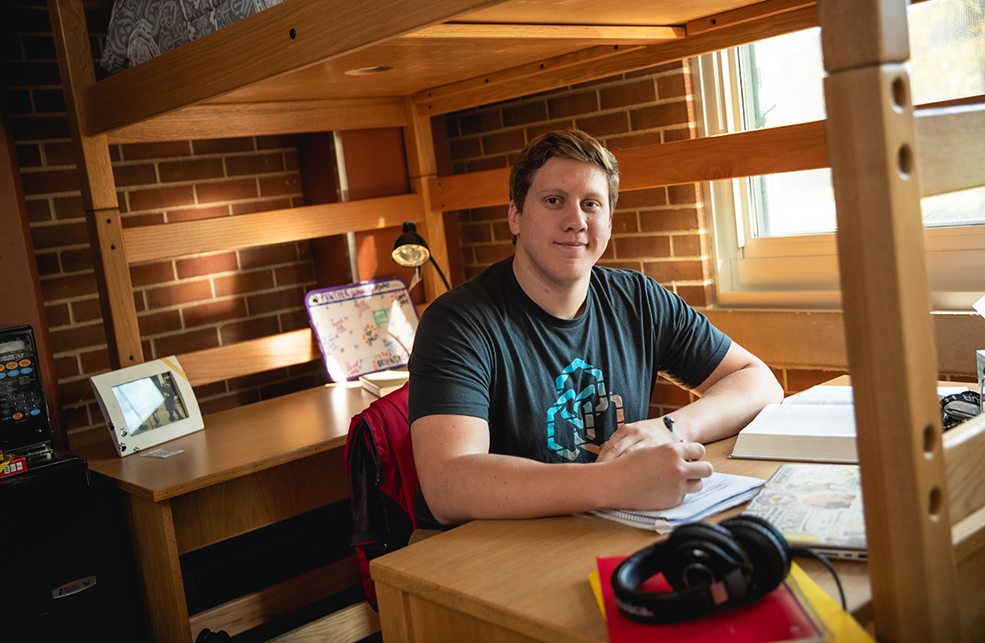 Student studying in a dorm